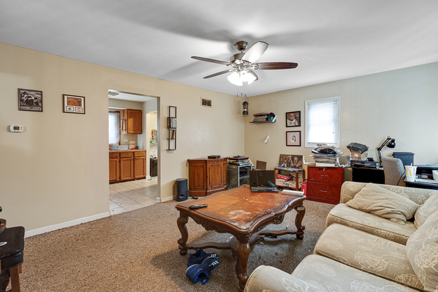 81-83 Eagle Point Road Fox Lake, IL 60020 - Photo 12 of 23 a living room with furniture and wooden floor