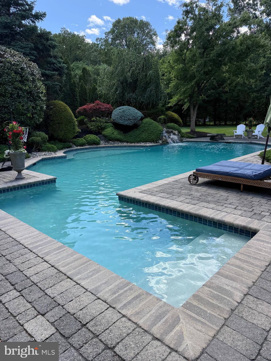 44 Walters Road Robbinsville, NJ 08691 - Photo 68 of 68 a view of a lake with a yard and a fountain