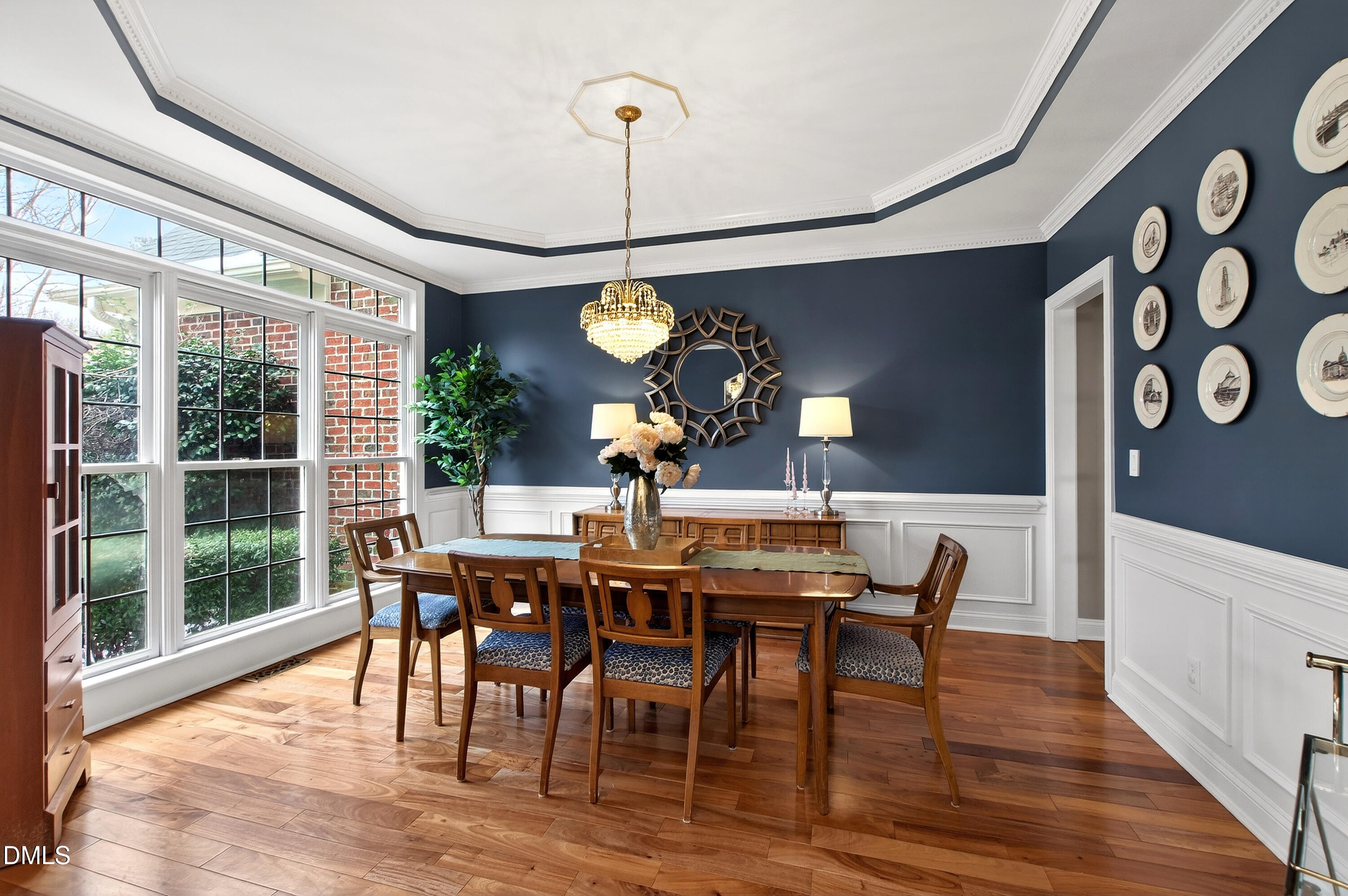 12325 Camberwell Court Raleigh, NC 27614 - Photo 10 of 76 a view of a dining room with furniture window and wooden floor