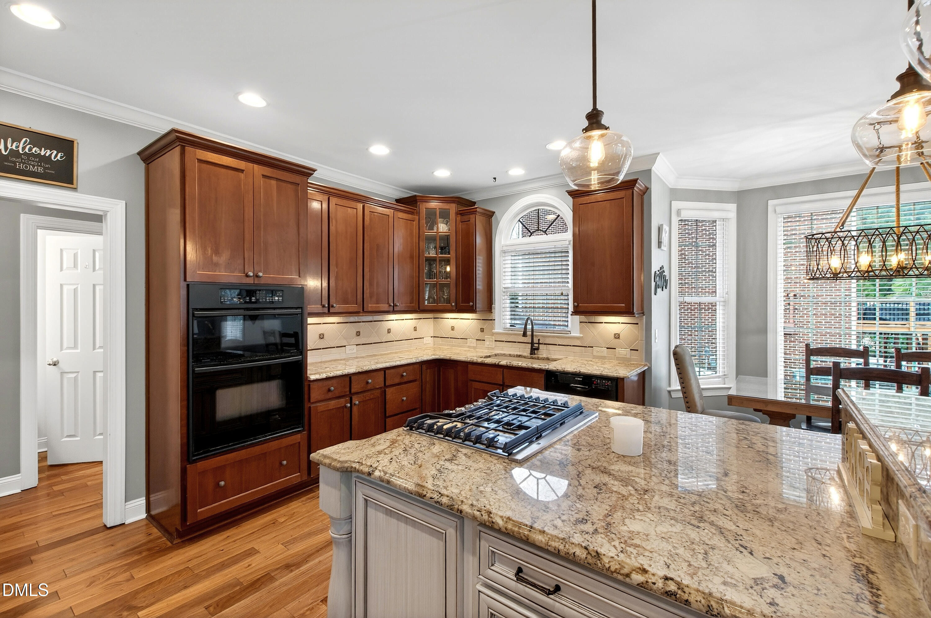 12325 Camberwell Court Raleigh, NC 27614 - Photo 24 of 76 a kitchen with a stove a sink and a refrigerator