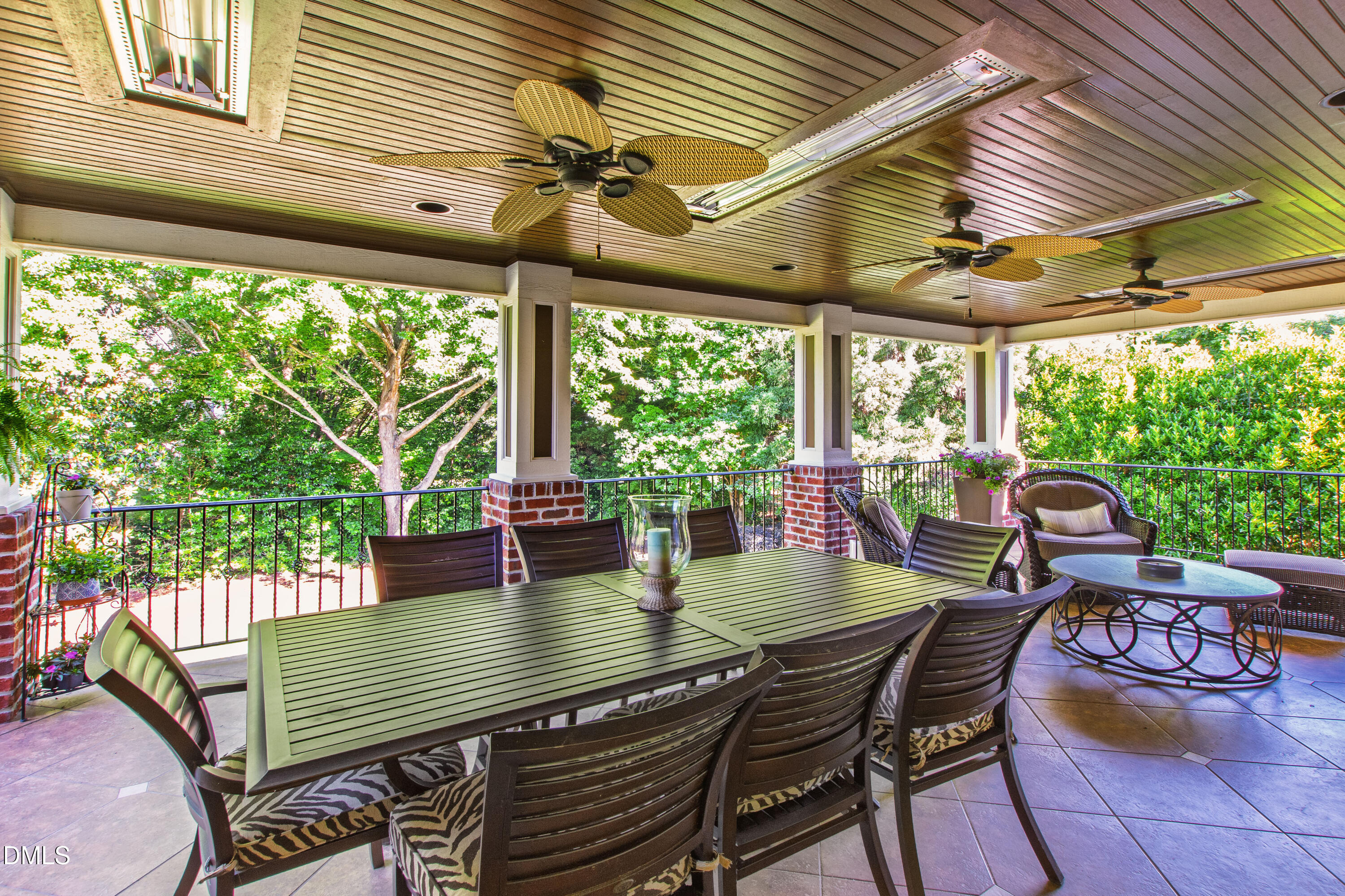 12325 Camberwell Court Raleigh, NC 27614 - Photo 29 of 76 a view of a patio with a table chairs and a backyard