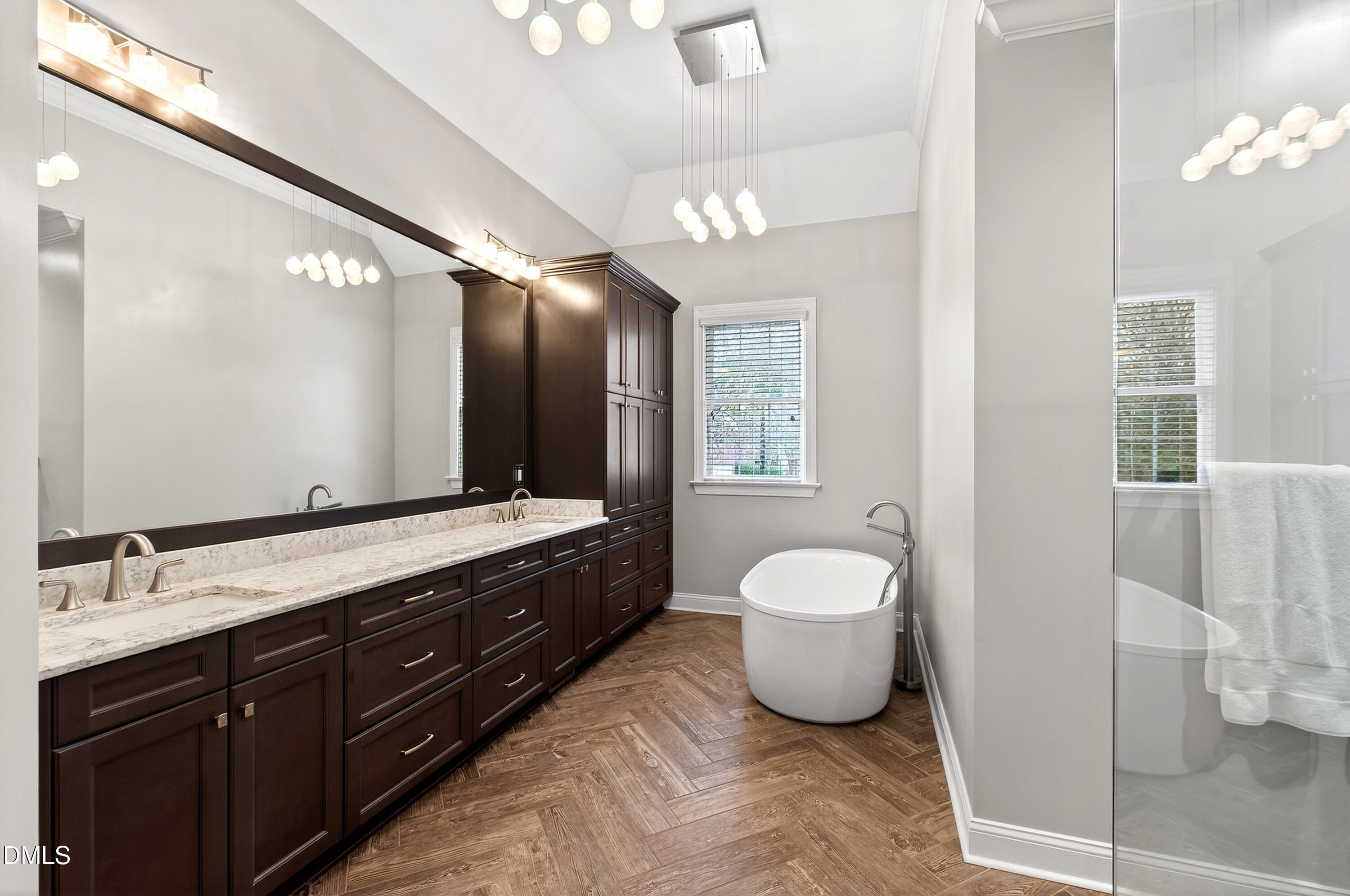 12325 Camberwell Court Raleigh, NC 27614 - Photo 37 of 76 a spacious bathroom with a granite countertop sink and a mirror