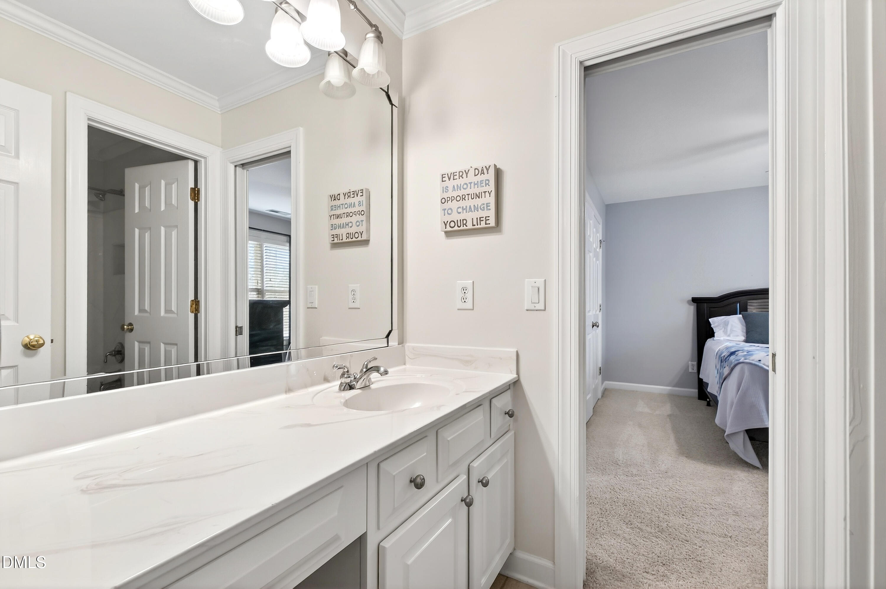 12325 Camberwell Court Raleigh, NC 27614 - Photo 42 of 76 a spacious bathroom with a sink double vanity and a mirror