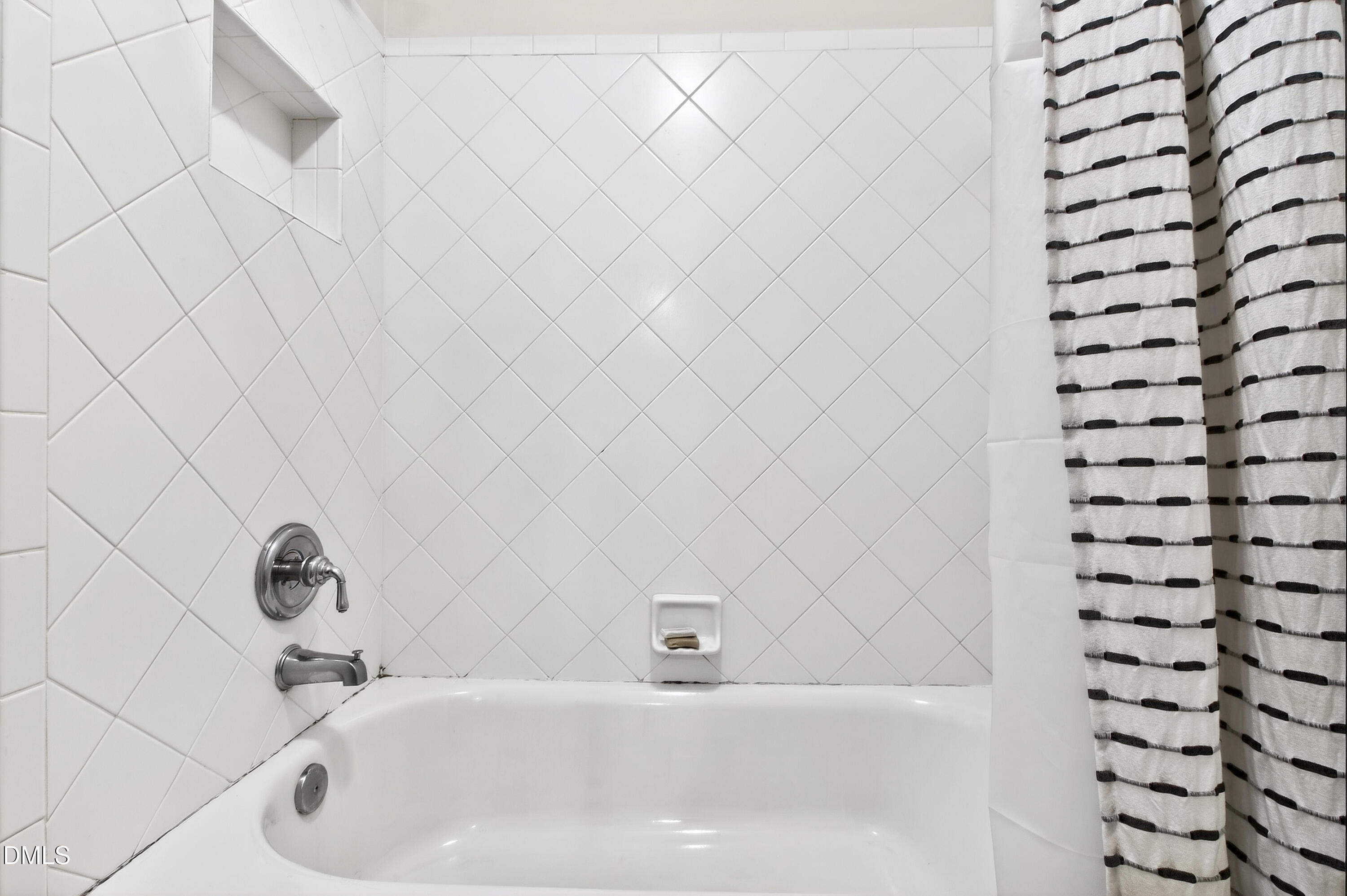 12325 Camberwell Court Raleigh, NC 27614 - Photo 43 of 76 a bathroom with a white sink and a shower
