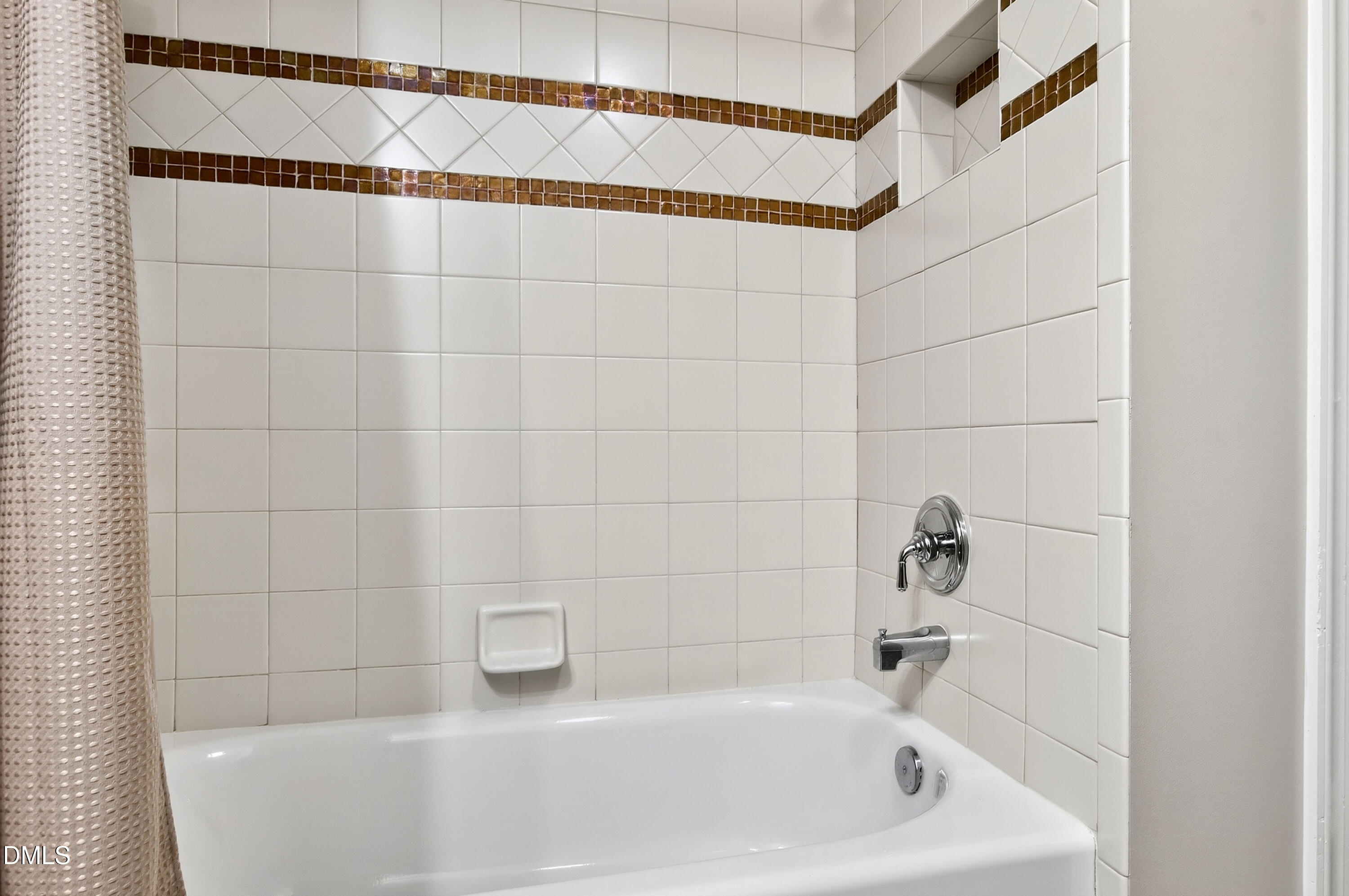 12325 Camberwell Court Raleigh, NC 27614 - Photo 66 of 76 a bathroom with a white bathtub