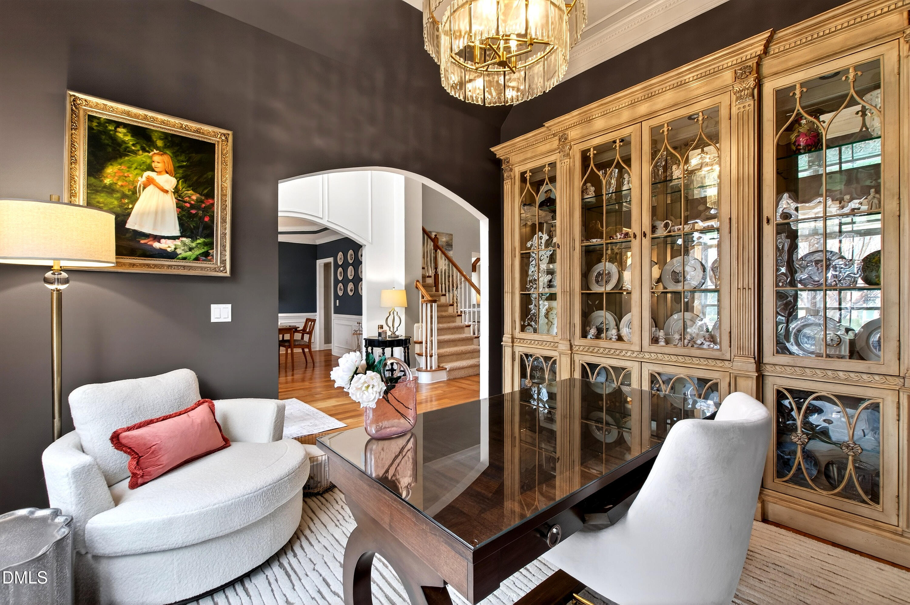 12325 Camberwell Court Raleigh, NC 27614 - Photo 9 of 76 a living room with furniture a chandelier and a large window