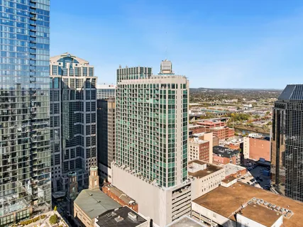 a view of a city with tall buildings