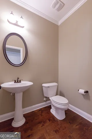 a view of room with a ceiling fan and window