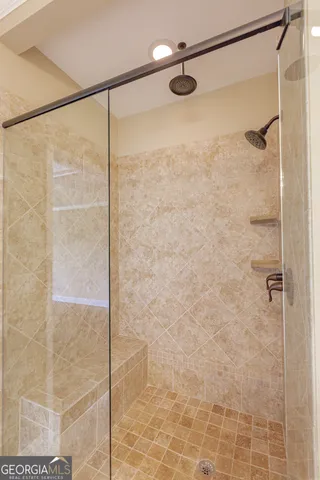 a bedroom with a bed and a closet