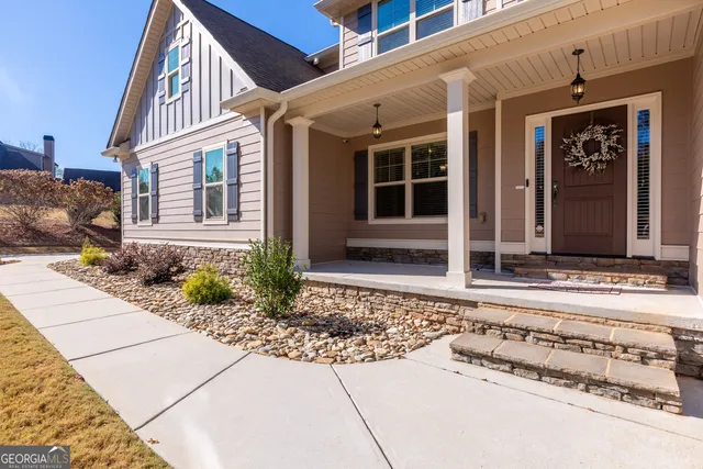 a view interior of a house with stairs and a living room
