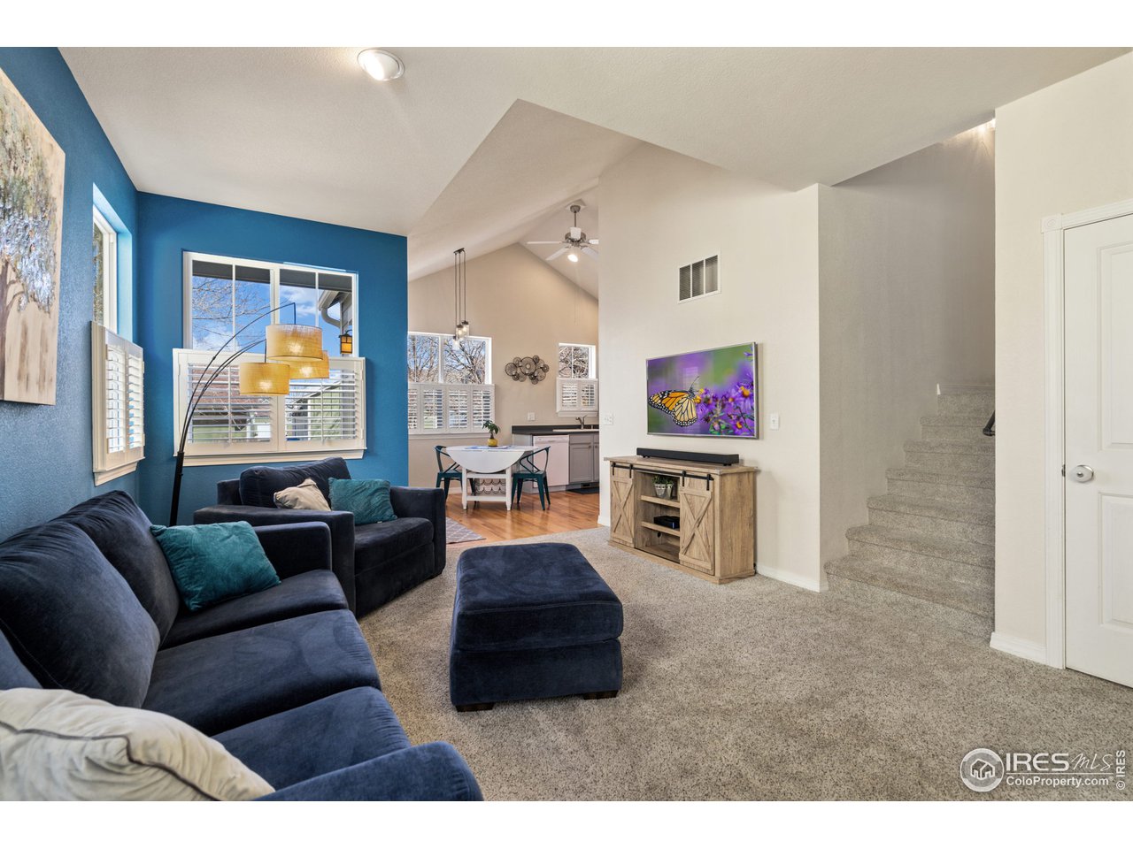 2250 Trestle Road Fort Collins, CO 80525 - Photo 5 of 22 Living Room flowing into Kitchen