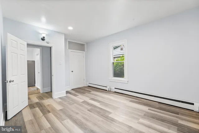 a view of an empty room and window