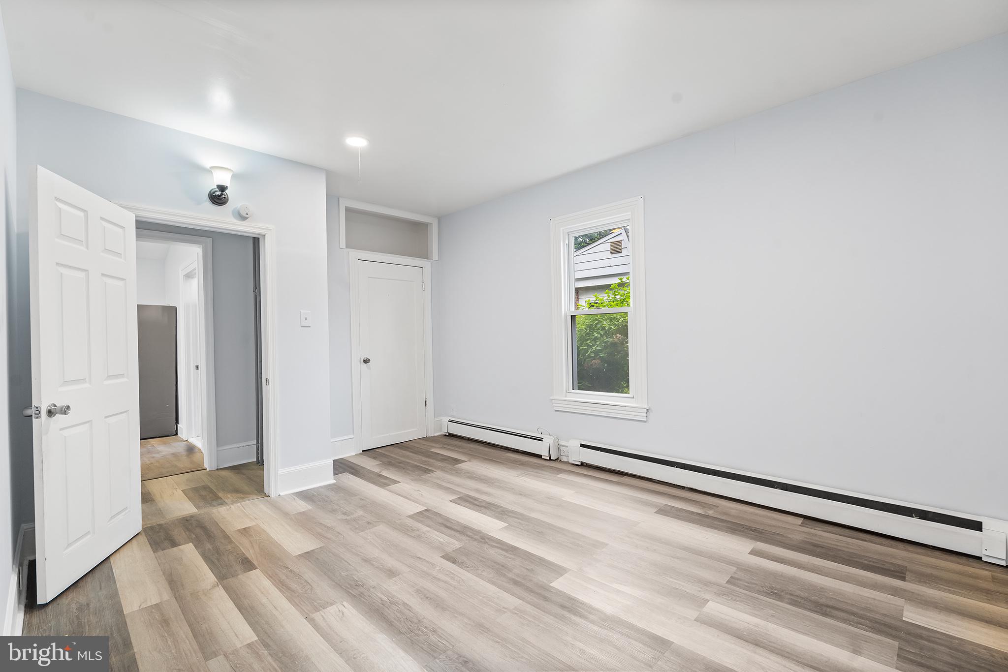 131 West Clinton Street Clayton, NJ 08312 - Photo 12 of 41 a view of an empty room and window