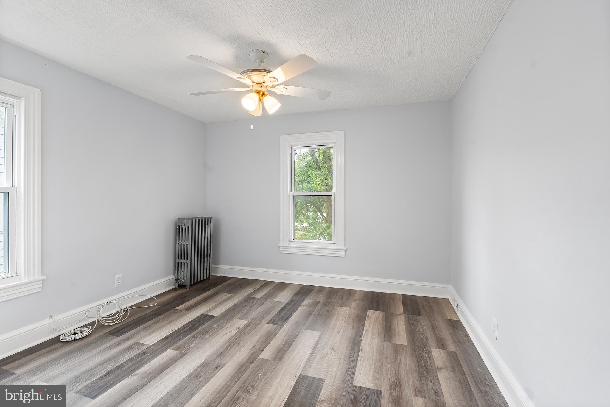 131 West Clinton Street Clayton, NJ 08312 - Photo 25 of 41 a view of empty room with window