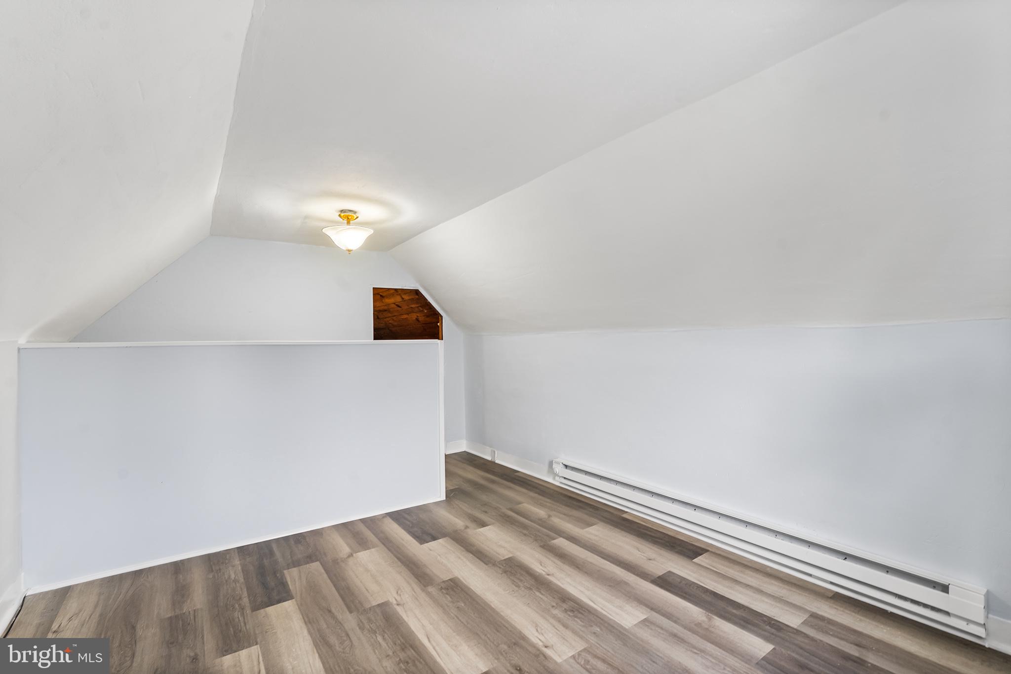 131 West Clinton Street Clayton, NJ 08312 - Photo 32 of 41 a view of a room with wooden floor