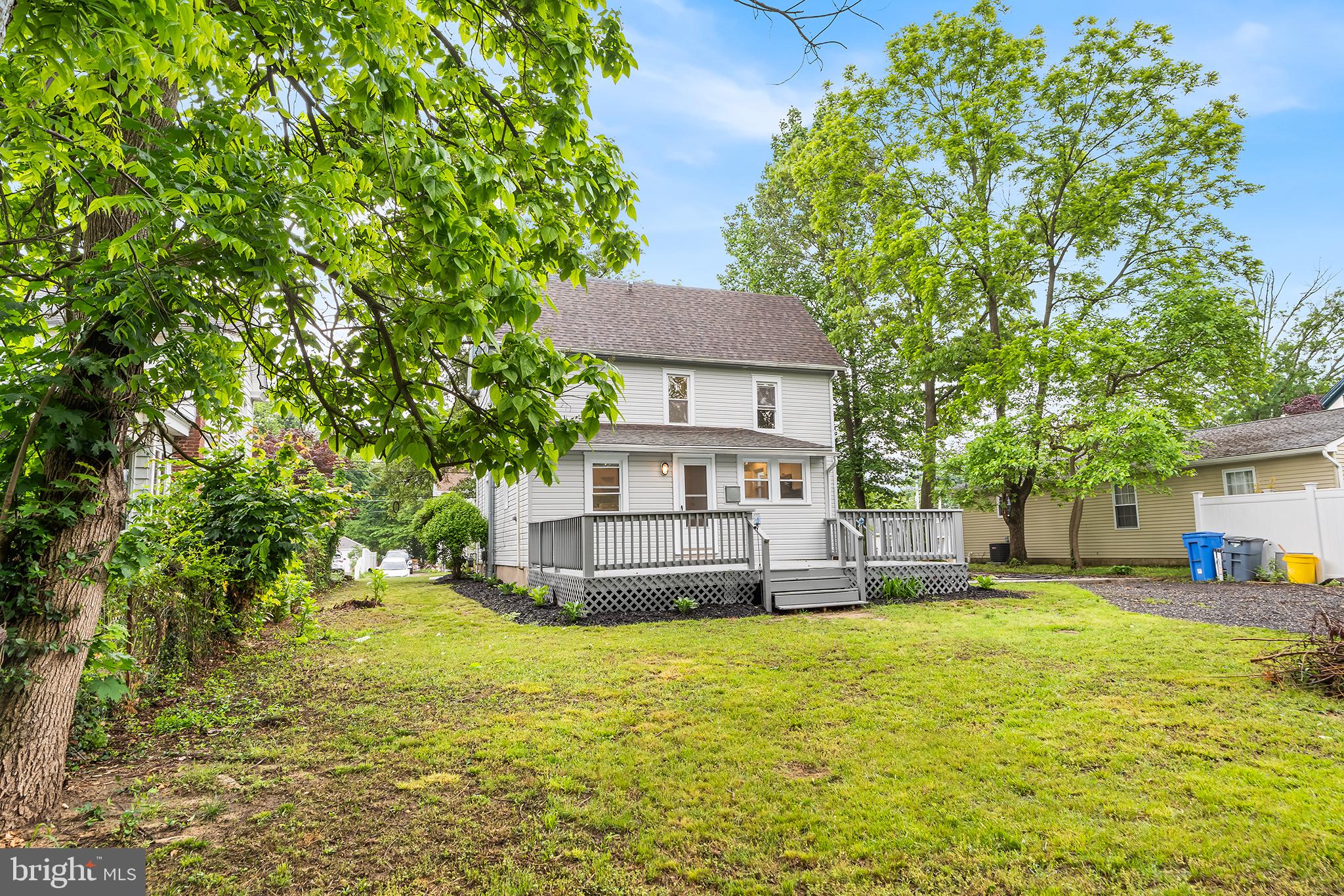 131 West Clinton Street Clayton, NJ 08312 - Photo 39 of 41 a view of a house with a yard and sitting area