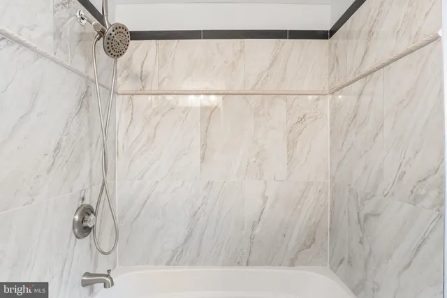 a bathroom with a shower curtain