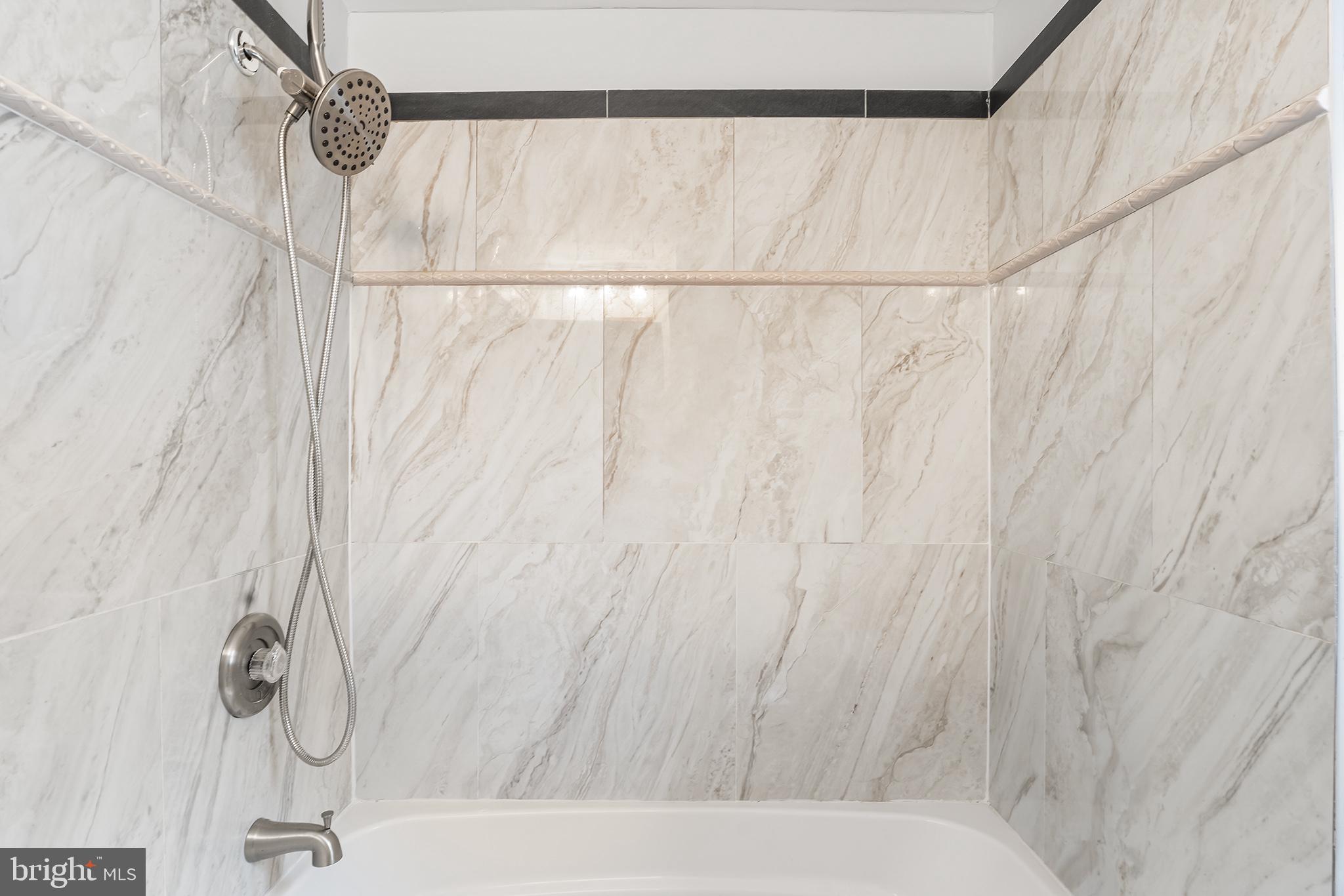 131 West Clinton Street Clayton, NJ 08312 - Photo 4 of 41 a bathroom with a shower curtain