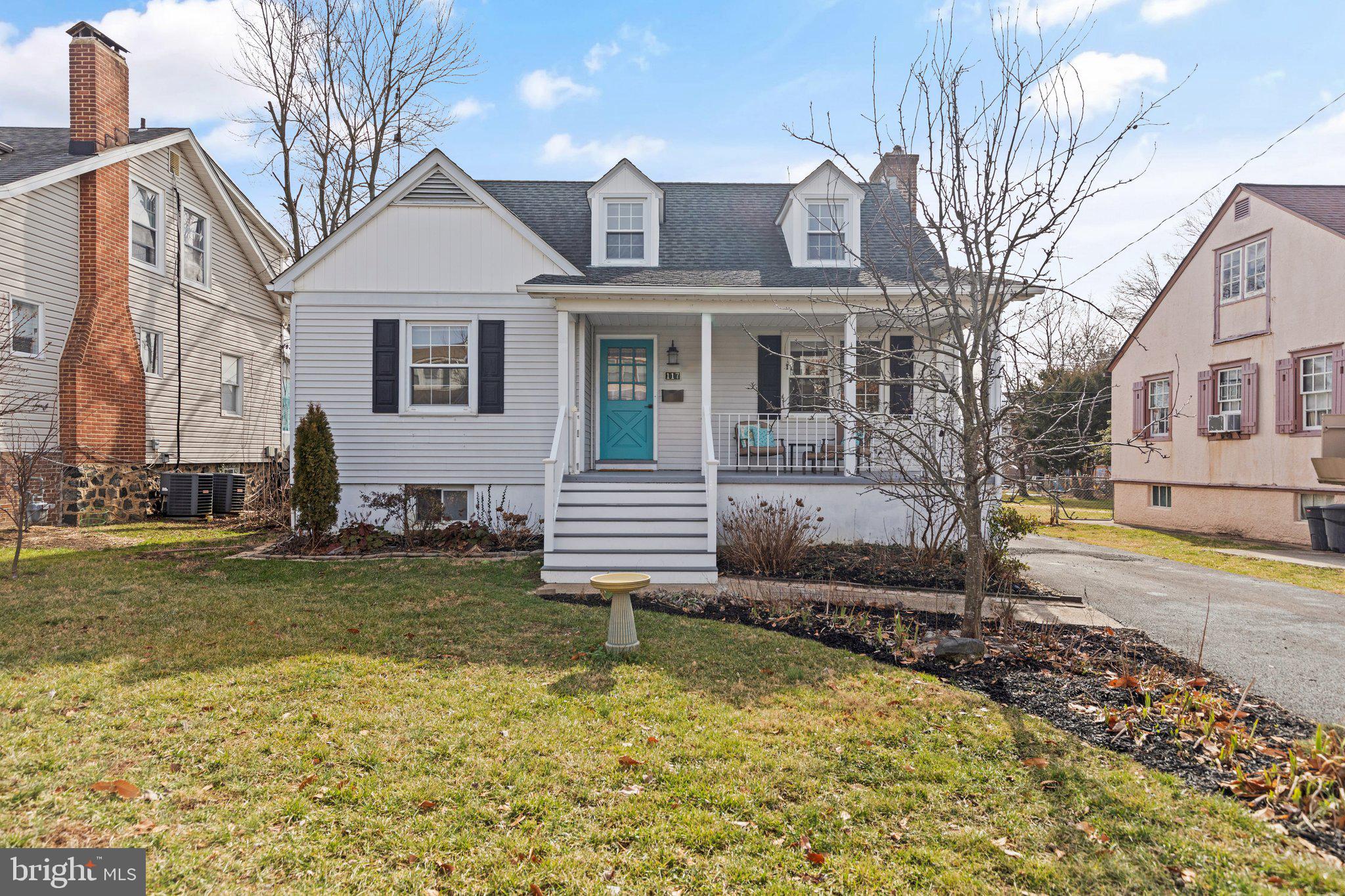 117 Clarendon Avenue Baltimore, MD 21208 - Photo 1 of 42 a front view of a house with swimming pool