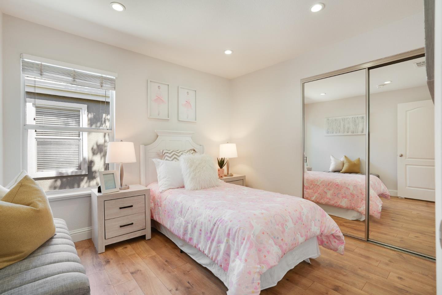 394 Oleander Drive San Jose, CA 95123 - Photo 16 of 27 a bedroom with a bed and a couch