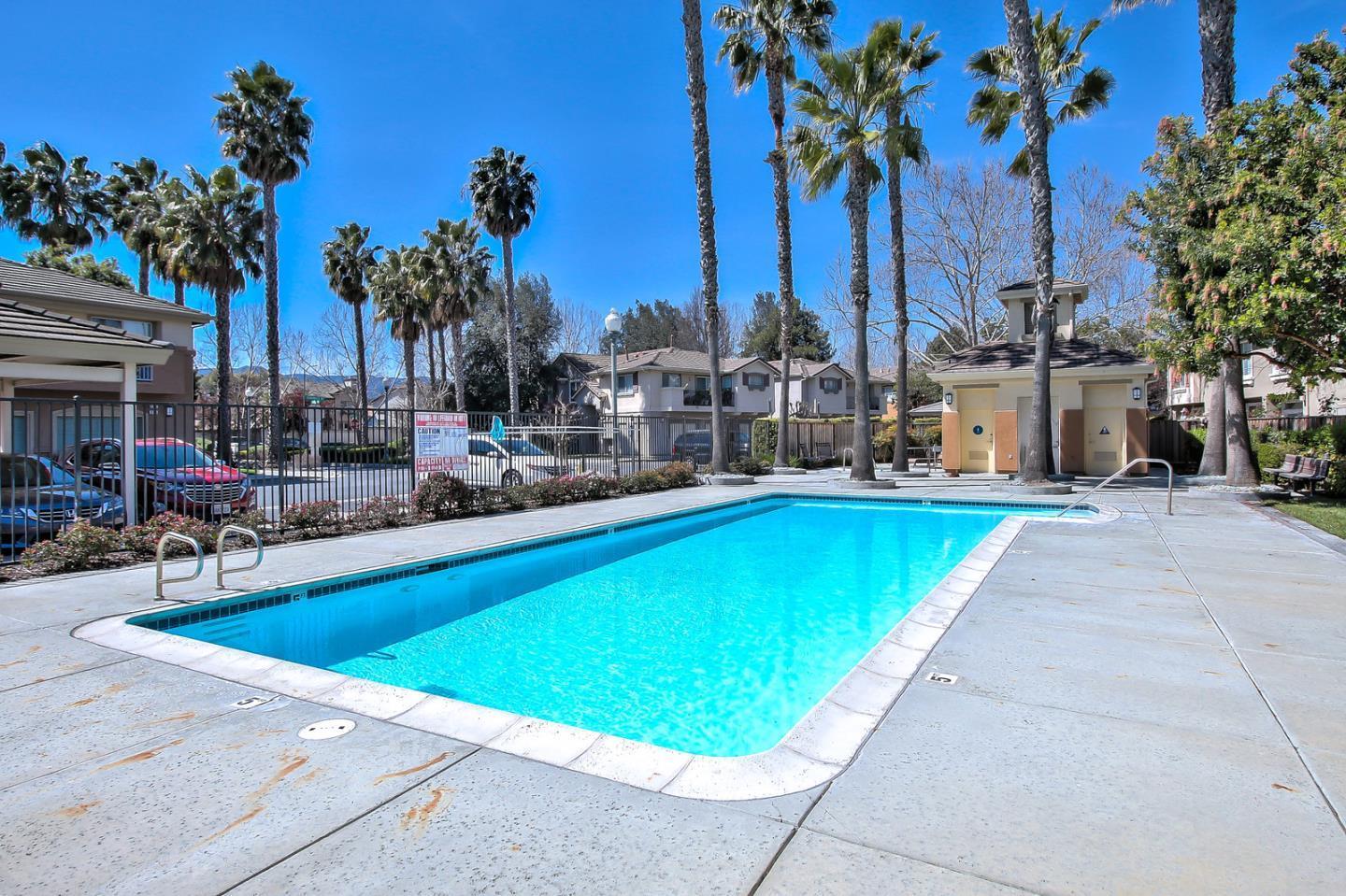 394 Oleander Drive San Jose, CA 95123 - Photo 23 of 27 a swimming pool with outdoor seating and yard