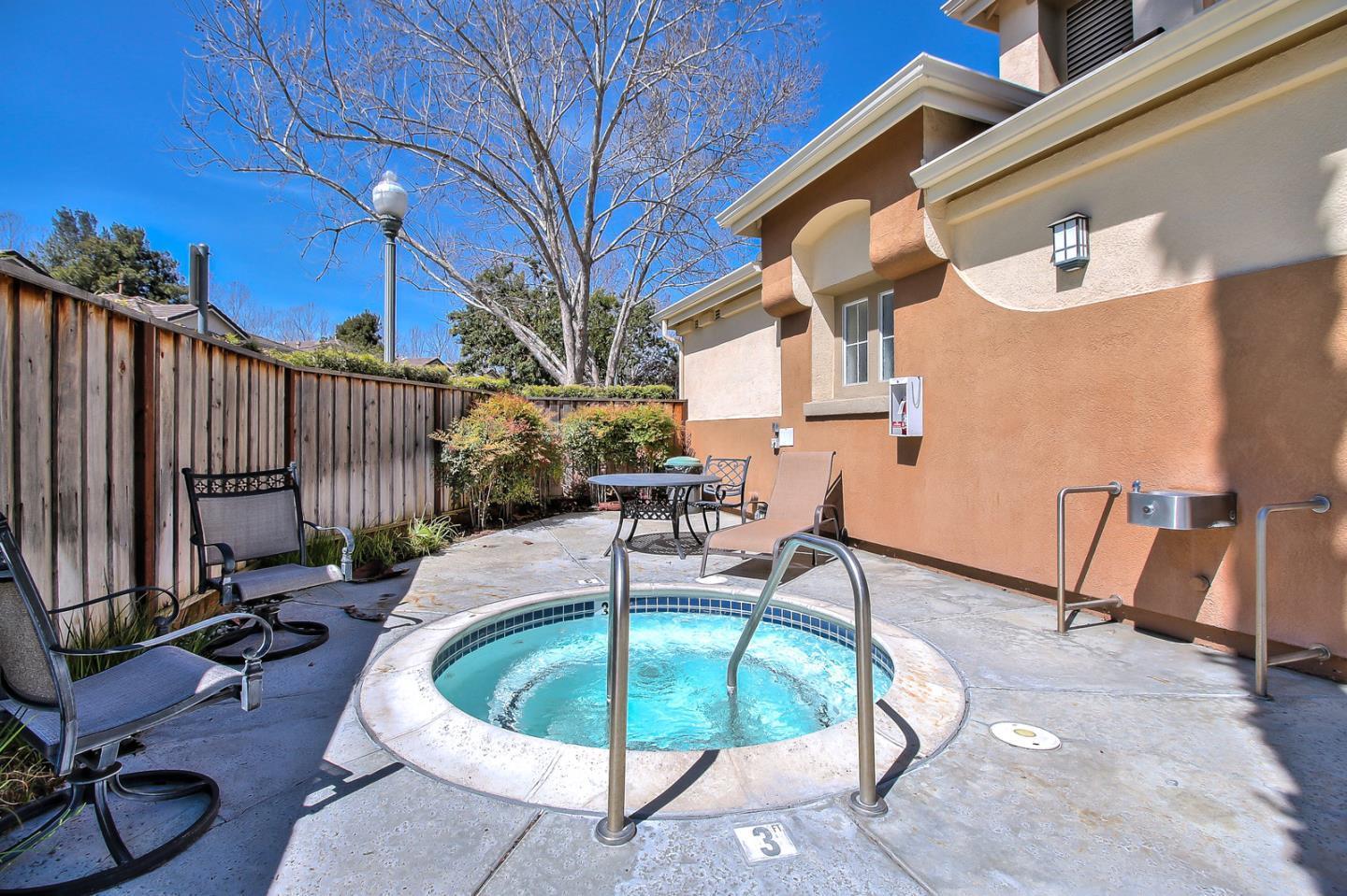 394 Oleander Drive San Jose, CA 95123 - Photo 25 of 27 a table and chairs in a patio