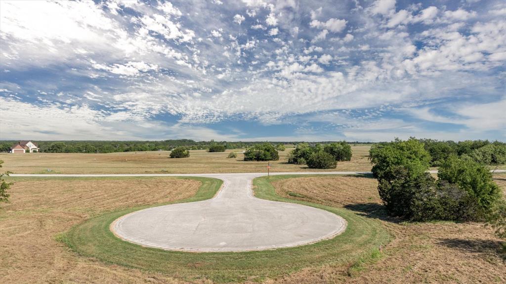 7308 Castle Royle Court Cleburne, TX 76033 - Photo 1 of 35 View of property's community featuring a rural view
