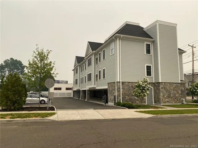 a view of a street with houses