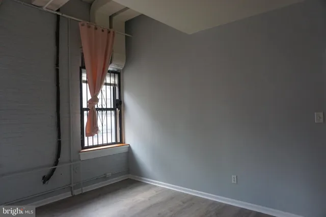 a view of walk in closet with window