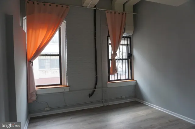 an empty room with windows