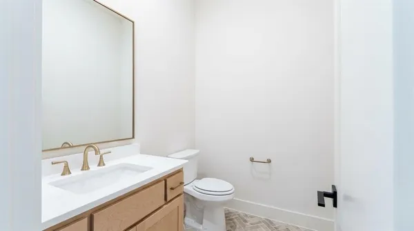 a bathroom with a sink and a toilet