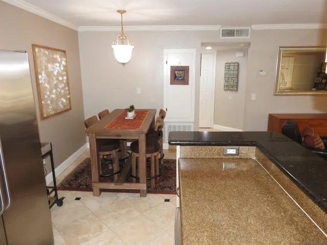 a kitchen with a stove and a sink