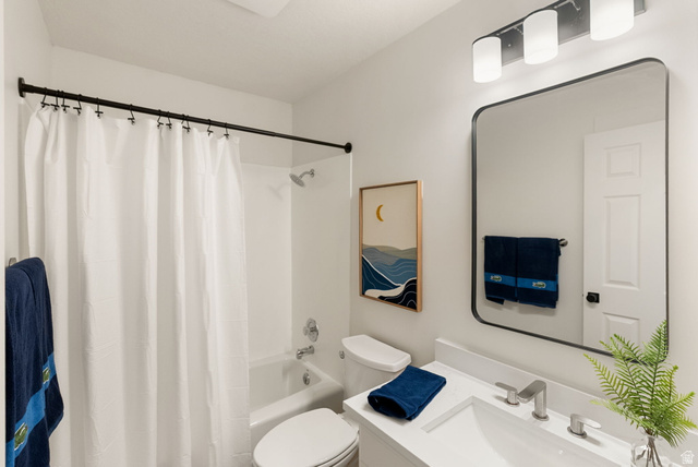368 Spring Creek Road Providence, UT 84332 - Photo 22 of 45 Full bathroom with vanity and shower / bathtub combination with curtain