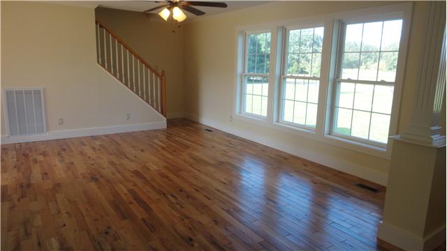 4141 Roarks Cove Road Decherd, TN 37324 - Photo 5 of 20 wooden floor in an empty room with a window