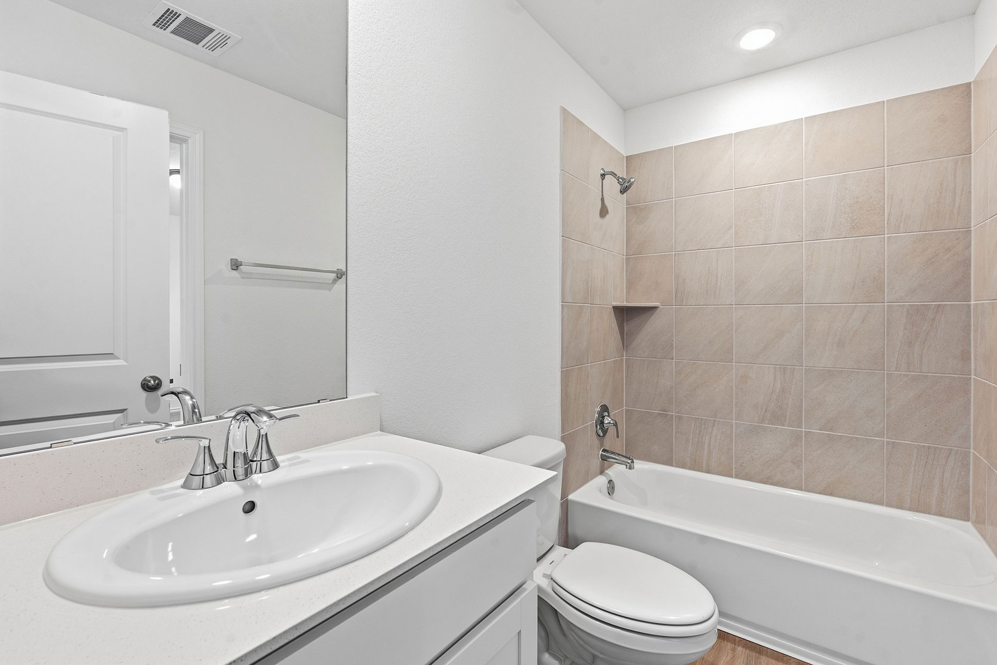 164 Cinnabar Lane, Unit 4 Kyle, TX 78640 - Photo 19 of 23 Bathroom featuring a white vanity with an oval sink, chrome faucet, and integrated mirror