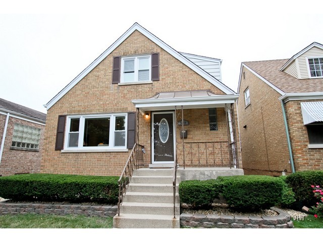 2250 Northgate Avenue North Riverside, IL 60546 - Photo 1 of 17 a front view of a house with a yard