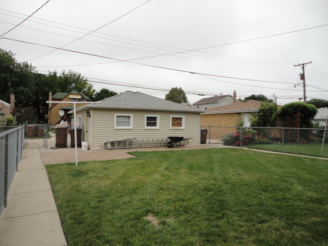 2250 Northgate Avenue North Riverside, IL 60546 - Photo 16 of 17 a front view of a house with a garden