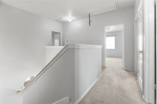 a view of hallway with stairs