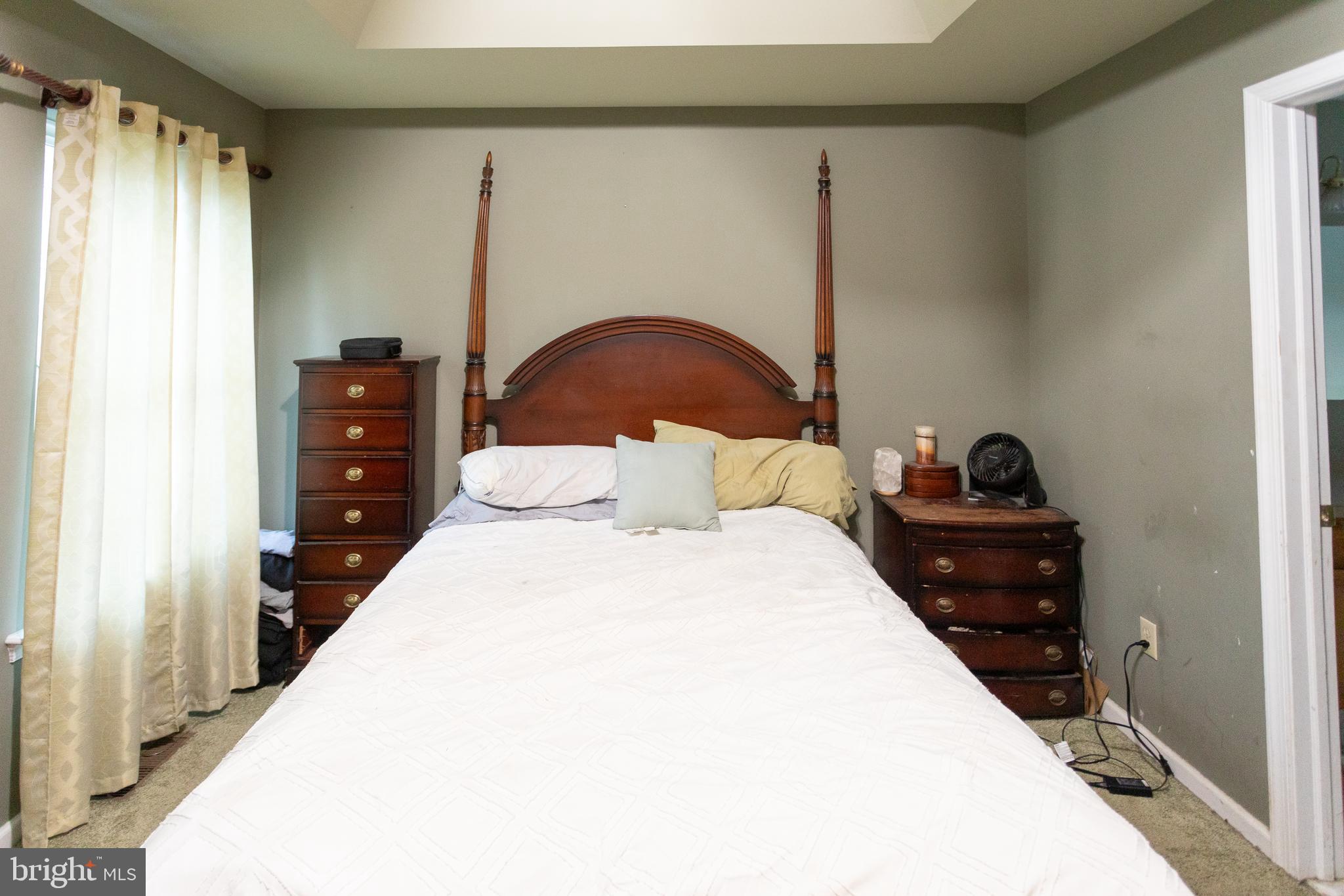 356 North State Road Springfield, PA 19064 - Photo 18 of 26 a bedroom with a bed and a dresser