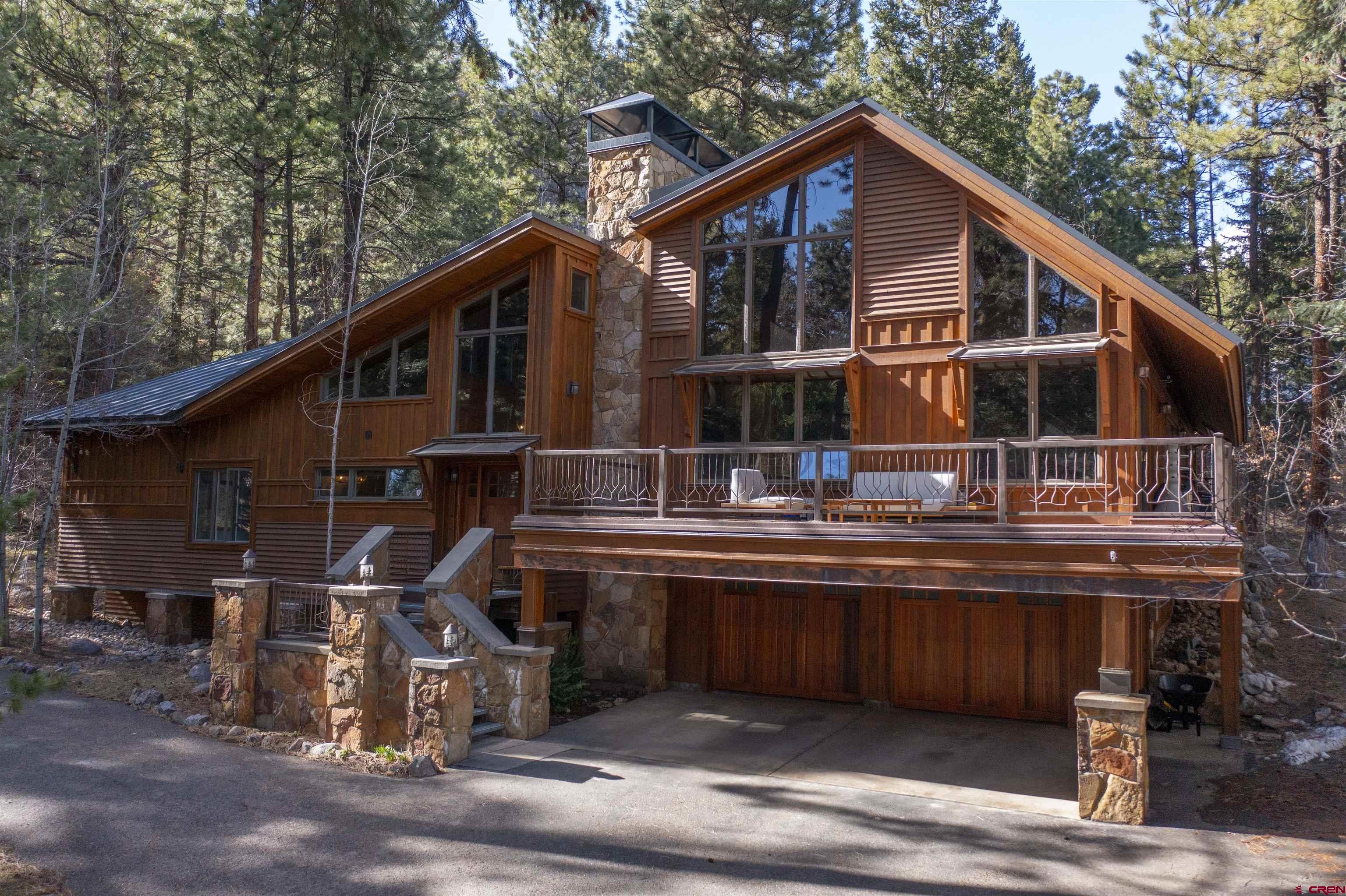 75 Rockwood Drive Durango, CO 81301 - Photo 23 of 24 a front view of a house with a yard