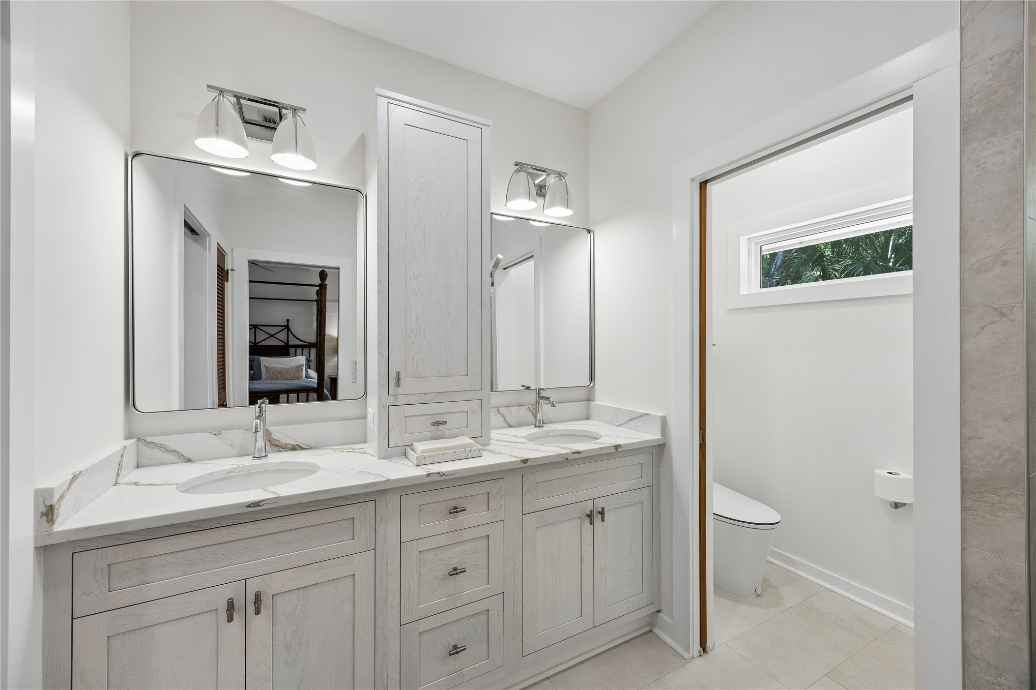 123 Bitternut Road Fernandina Beach, FL 32034 - Photo 39 of 87 Primary bath has been completely renovated with new double vanities, new cabinetry, quartz countertops, new plumbing fixtures, mirrors and lighting and a spalike "smart" toilet.