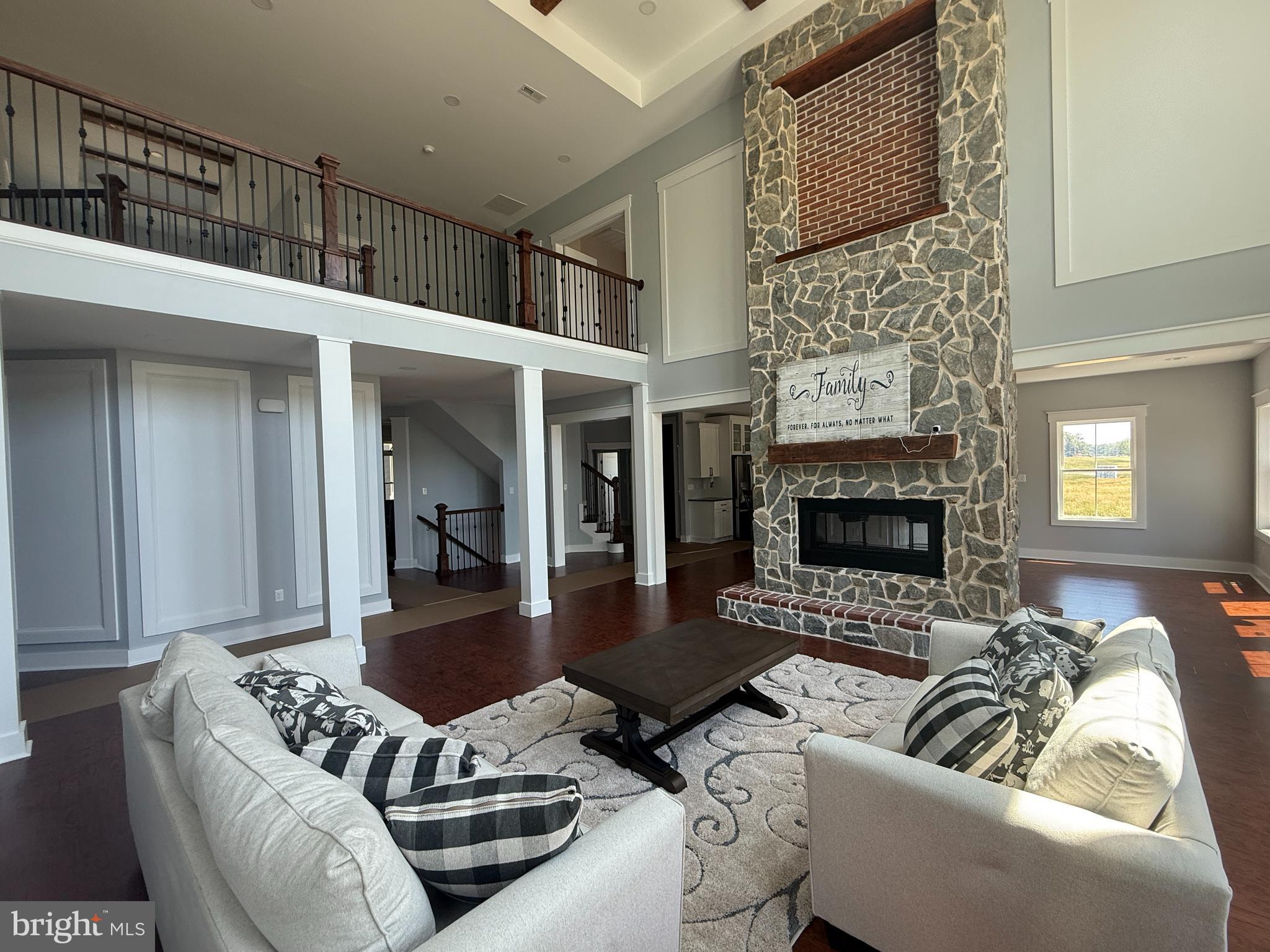 5482 Summit Bridge Road Townsend, DE 19734 - Photo 2 of 43 a living room with furniture and a fireplace