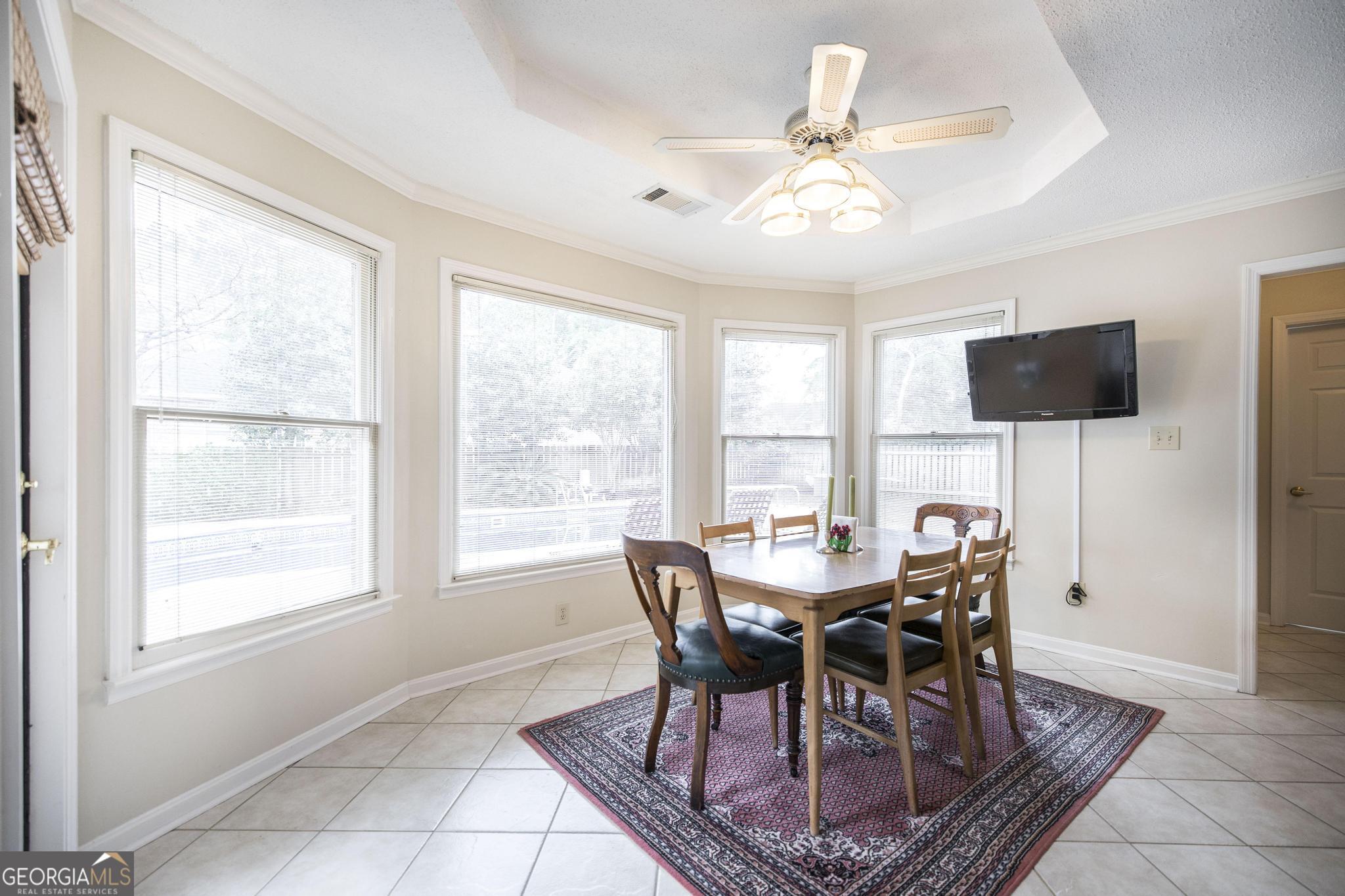 108 Bunkers Trail Warner Robins, GA 31088 - Photo 12 of 34 a view of a dining room with furniture window and outside view