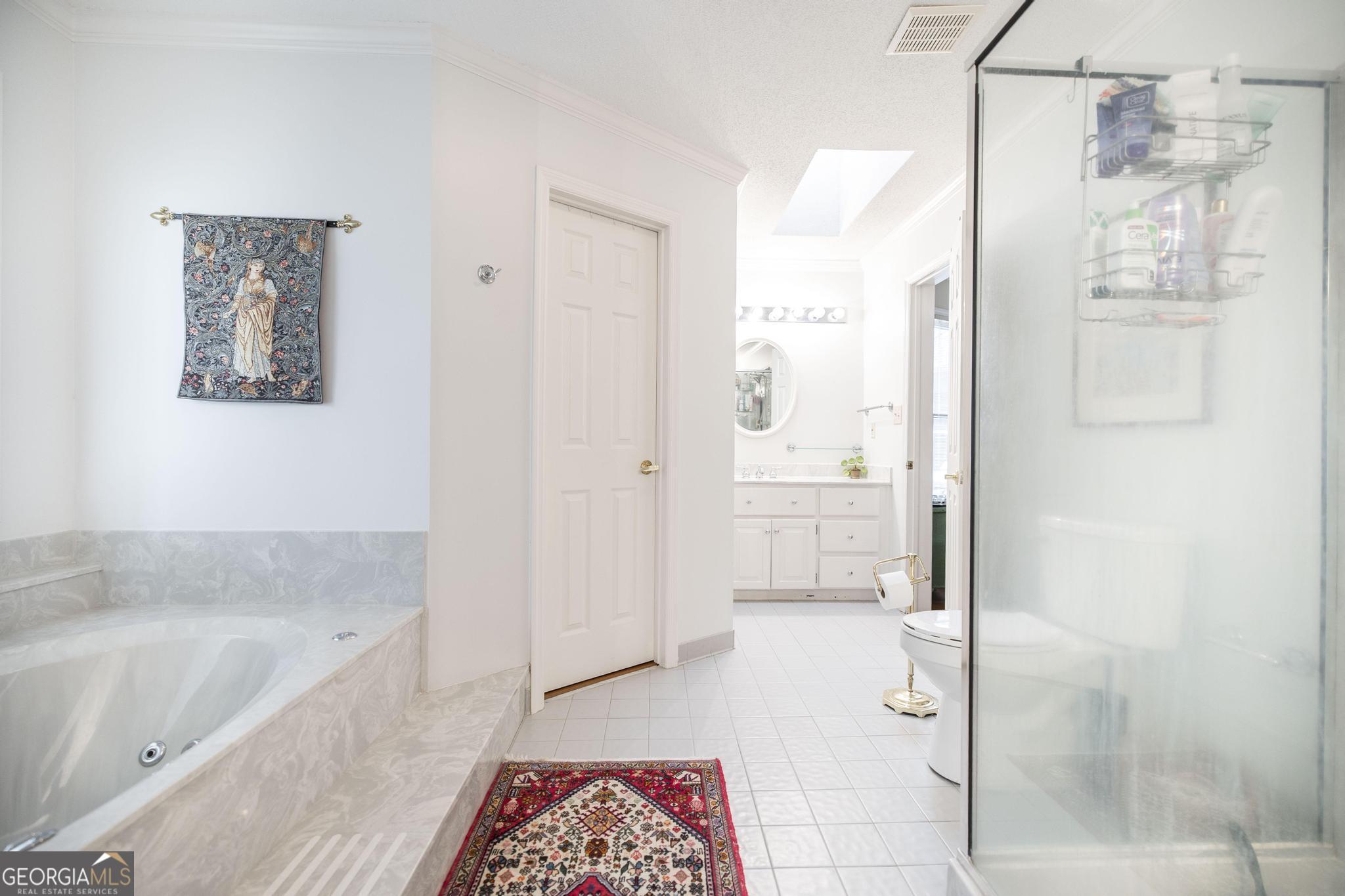 108 Bunkers Trail Warner Robins, GA 31088 - Photo 23 of 34 a bathroom with a bathtub and shower