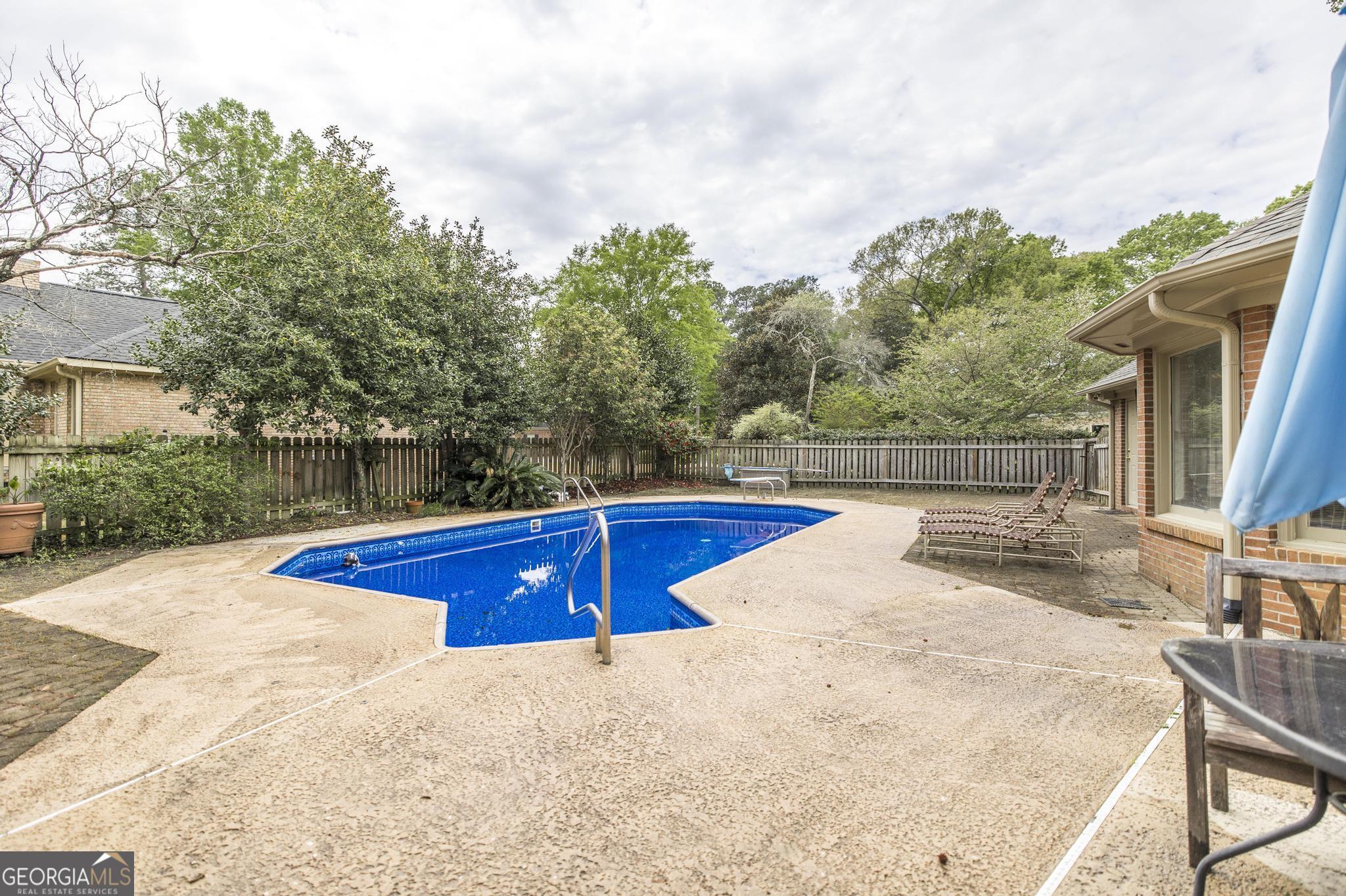 108 Bunkers Trail Warner Robins, GA 31088 - Photo 30 of 34 a view of a backyard with swimming pool