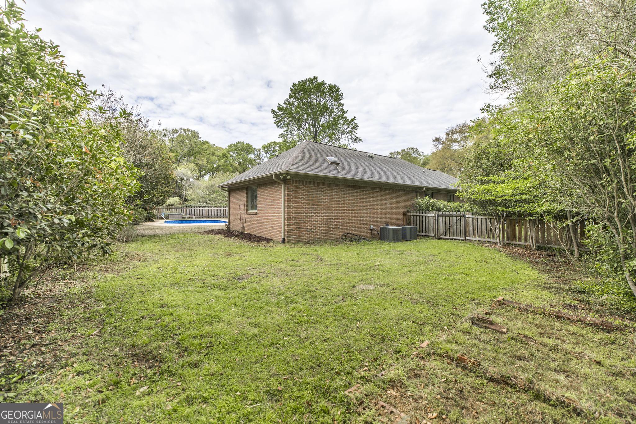 108 Bunkers Trail Warner Robins, GA 31088 - Photo 34 of 34 a view of a house with a yard