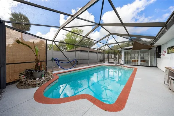 a view of a swimming pool with a tub