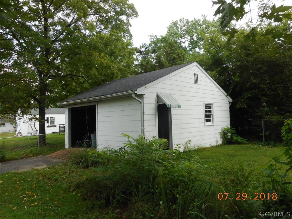 4707 East Caryhurst Road Richmond, VA 23223 - Photo 3 of 11 a view of a house with a yard