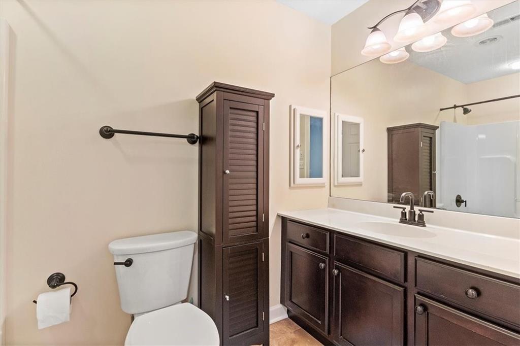 358 Wealdstone Road Cranberry Township, PA 16066 - Photo 28 of 46 a bathroom with a toilet a sink and mirror