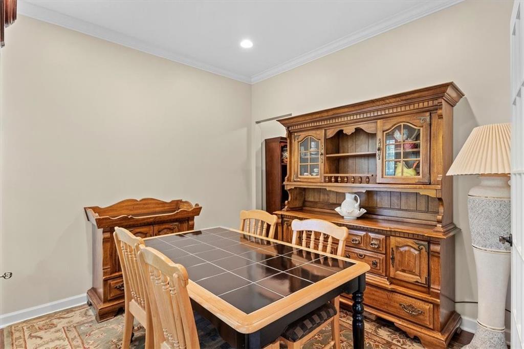 358 Wealdstone Road Cranberry Township, PA 16066 - Photo 6 of 46 a view of a dining table and chairs in the room
